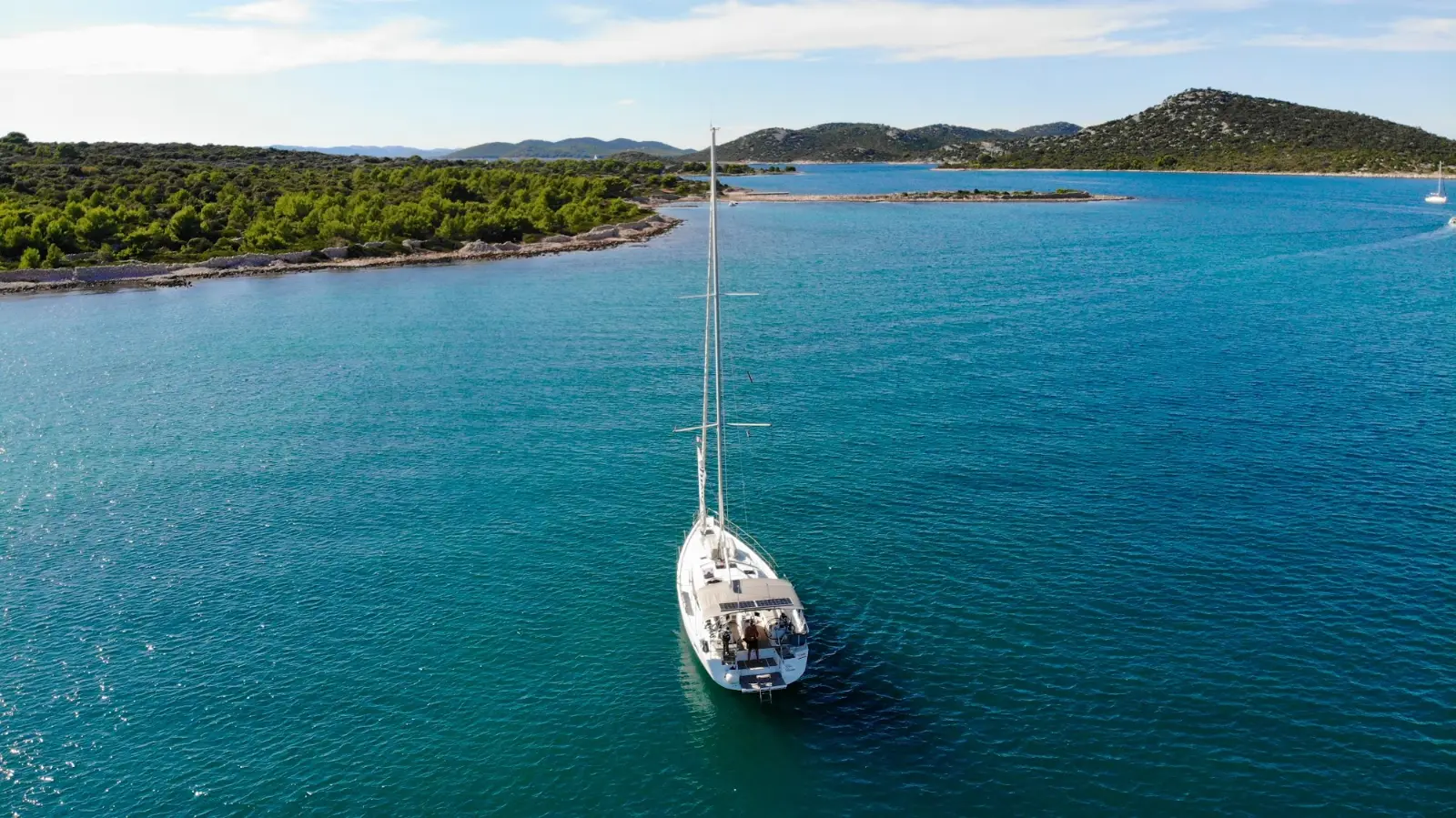 A KEK yacht at anchor off the islands